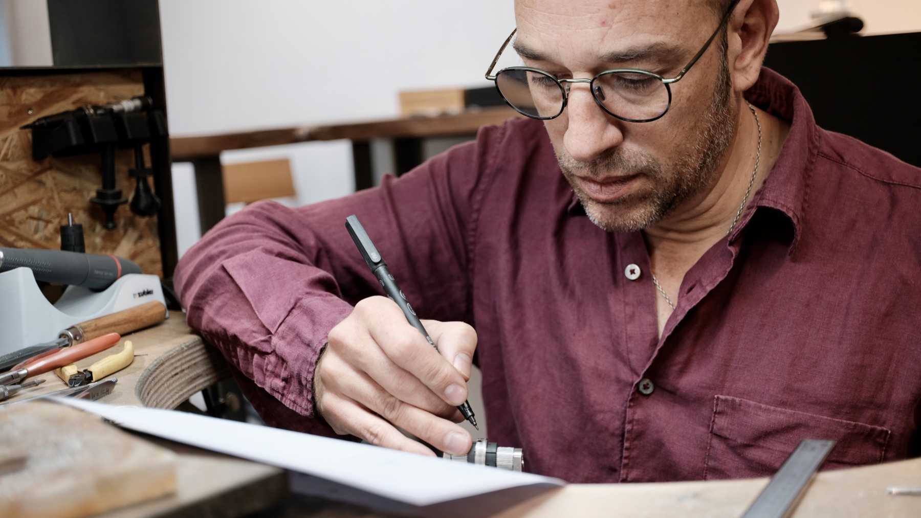 Michael Andrés von Hobe drawing and designing in his Berlin workshop
